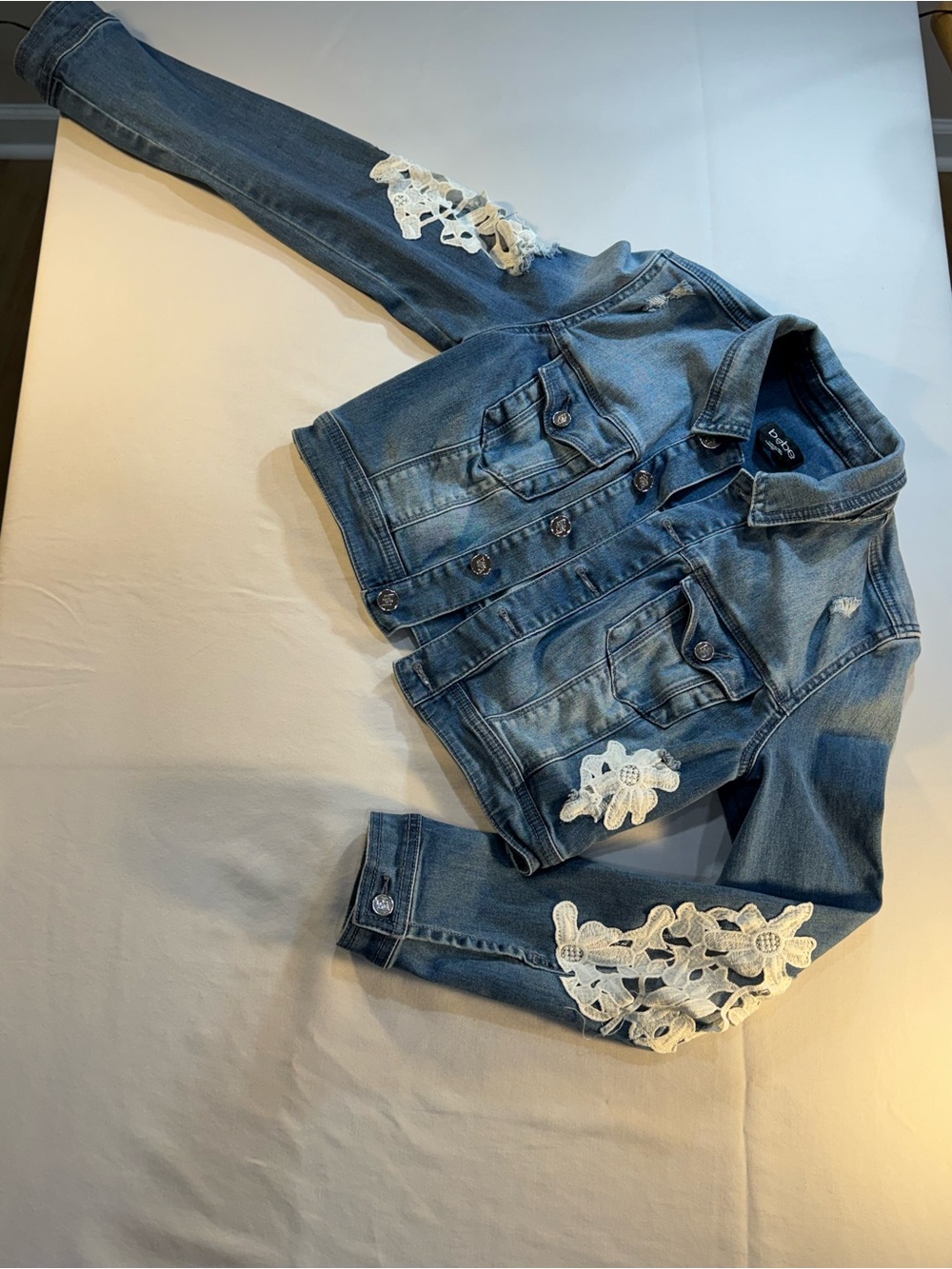Bebe Denim Crop Jacket with White Lace Appliqué - Blue